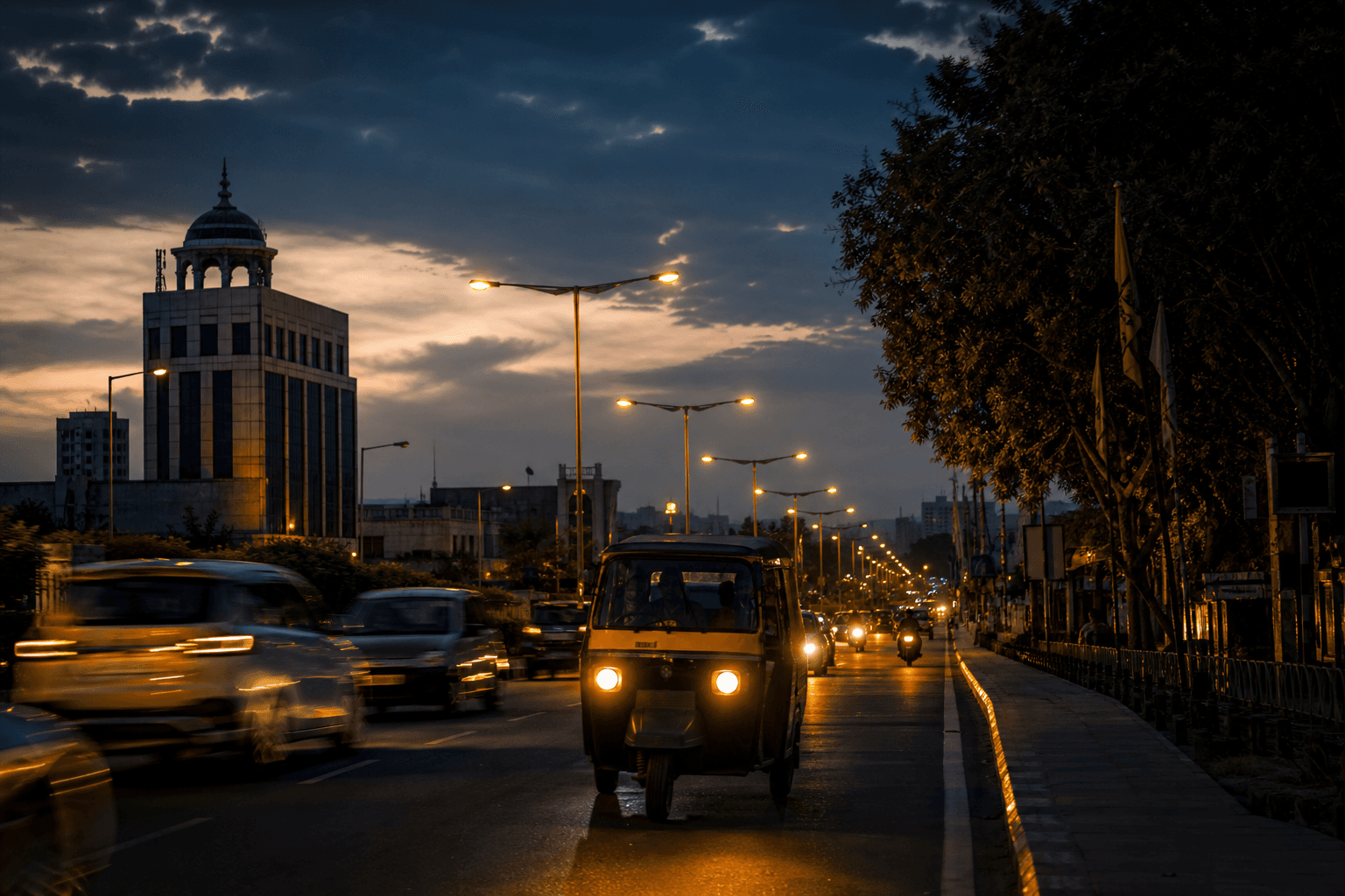 Coimbatore evening mobility — autos and city lights